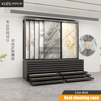 Meuble combiné contemporain noir mat à tiroirs coulissants avec cadre métallique personnalisable pour l'affichage de dalles de carrelage et de pierre en showroom