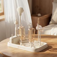 Séchoir à biberons portable tout-en-un avec brosse en silicone, plateau de drainage amovible et organisateur de rangement à séchage à l'air pour nouveau-né