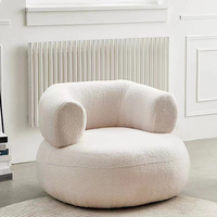 Mobilier élégant pour la maison Chaise ronde avec bras en forme de boucle Chaise de salon moderne en velours pour hôtel Chaise de canapé simple de luxe
