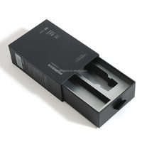 Boîte d'emballage rigide noire avec logo UV et insert en EVA pour flacon compte-gouttes en verre de 15 ml, idéale pour les produits d'huiles essentielles et sérums
