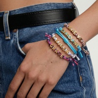 Bracelet en corde ajustable avec breloque lettre tissée et tricotée, design exclusif, promotionnel, personnalisé, coloré, accessoires de mode