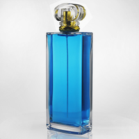 Flacon de parfum en verre rectangulaire transparent de luxe personnalisé de 200 ml avec une forme unique et un joli bouchon en acrylique