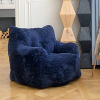 Fauteuil pouf moderne bleu marine surdimensionné avec dossier et accoudoirs enveloppants pour salon, chambre, maison, appartement, hôtel