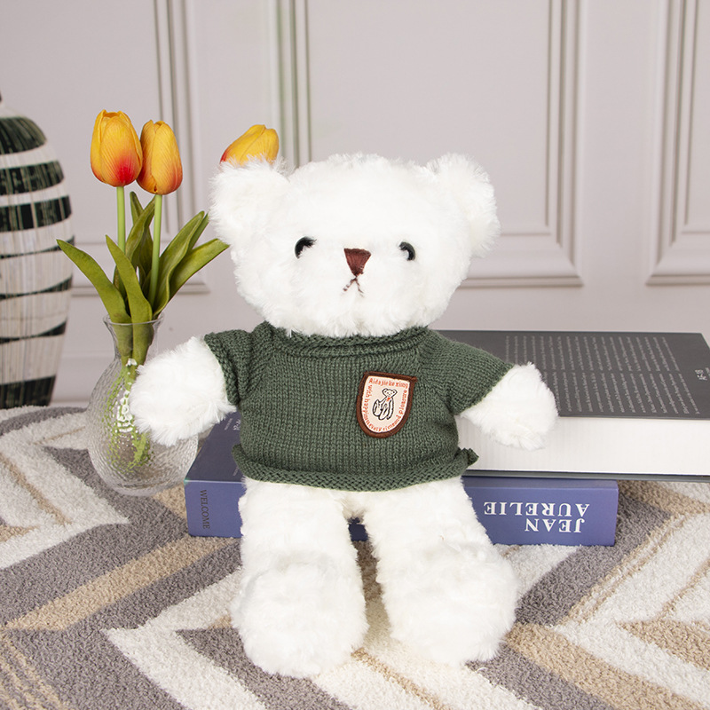Pull vert ours blanc