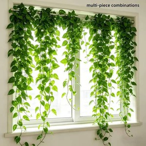 Feuilles et lianes artificielles vertes 200 cm et plus, guirlande de fausse vigne en plastique vert émeraude pour la décoration de fenêtres et de plafonds - Product Image 1