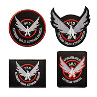 Badge Velcro brodé Phoenix Extreme Remedies avec bordure rouge pour sacs à dos et vêtements - Vente en gros