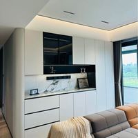 Cuisine d'extérieur moderne Vermont en acier inoxydable noir, écologique, avec armoires, grand four à pizza, évier, charnières et plan de travail blanc