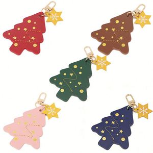 Stocked <b>Creative</b> Pu Leather Christmas Tree Keychain Gold Stamping Pendant Charms Women Backpack Welcome Business <b>Gifts</b> Portable - Product Image 3