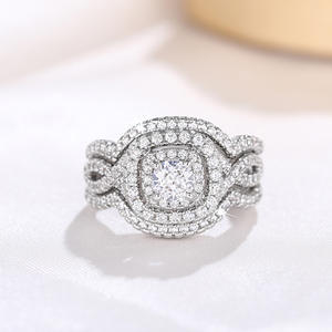 Anello di fidanzamento da donna Q024 in oro bianco con diamante taglio brillante rotondo, colore D naturale, design a halo - Product Image 6