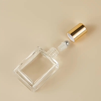 Bouteilles de parfum en verre portables de qualité supérieure de 10ml applicateur à boule roulante conceptions miniatures lisses uniques parfum luxueux fantaisie