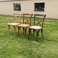 Vente directe ODM/OEM de chaises empilables en résine aspect bois, style croisé, pour banquets et mariages