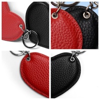 Breloque de téléphone en cuir grainé de luxe en forme de cœur, porte-clés, pendentif de sac avec fermoir en métal argenté pour cadeau de Saint-Valentin et souvenir de mariage