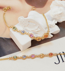 สร้อยข้อมือผีเสื้อประดับไพลินสีรุ้งทองคำแท้ 18K ยี่ห้อซินฟลาย |   สร้อยข้อมือประดับพลอยหลากสีธรรมชาติสำหรับผู้หญิง |   AU750 - Product Image 5