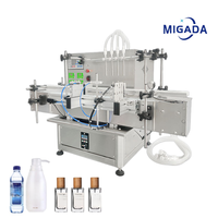 Machine de remplissage automatique de liquides à 4 têtes pour jus, vin, huile comestible, essence, eau minérale en bouteilles de verre