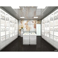 Façade de magasin de bijoux de luxe pour Atrium de centre commercial, conception personnalisée pour partenaire Fortune 500, revêtement métallique, mur-rideau en verre avec logo lumineux