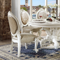 Ensemble de salle à manger de luxe en bois sculpté blanc royal européen, table ronde, chaises en cuir, vitrine de luxe
