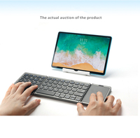 Clavier pliable Clavier sans fil avec pavé tactile Souris Mini clavier rechargeable pour Windows Phone PC Tablette