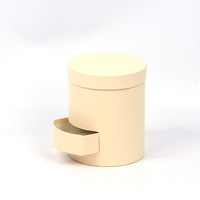Boîte cadeau ronde en carton rigide à double couche de couleur macaron avec gaufrage en feuille pour la vente en gros
