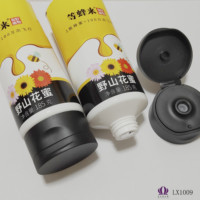 LIXIN/OEM LX10090 Guangdong de qualité alimentaire PCR plastique cosmétique fleur de montagne sauvage Honeytube avec différents couvercles de tubes