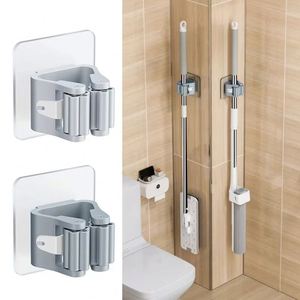 Waterproof <b>Wall</b>-Mounted Bathroom Storage Rack Traceless Mop Clip Broom Hanger Suction Hanging Pipe Rack with Mop Storage - Product Image 1