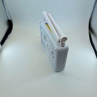 Routeur Wi-Fi Xpon F660 Blanc avec 1GE+3FE+1TEL+1USB+2.4G Double Bande ONT 741 Garantie 1 An pour Utilisation FTTH