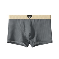 Nouveau Caleçon Boxer Tricoté Respirant pour Homme en Soie Glacée Huajielong, Couleur Unie, Taille Mi-Haute, Grande Taille, Vente en Gros, Disponible