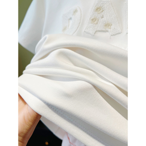 เสื้อยืดแขนสั้นสีชมพูสำหรับผู้หญิงในฤดูใบไม้ผลิและฤดูร้อน ทำจากผ้าฝ้ายแท้ พร้อมดีไซน์ปักลายหลวมๆที่ไหล่ - Product Image 5