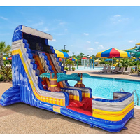 Toboggan aquatique gonflable commercial en PVC coloré bleu tropical avec piscine et palmier géant pour fêtes en extérieur – En stock