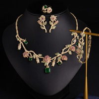 TIANSHE Europe Amérique Collier de fleurs haut de gamme pour femme, boucles d'oreilles en zircon personnalisées, ensemble de quatre pièces, accessoires en gros