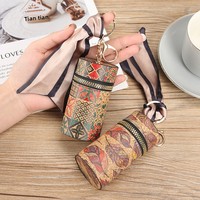 Porte-clés cylindrique à motif rétro, mini pochette en PU pour rouge à lèvres et monnaie, rangement portable pour écouteurs avec foulard en soie