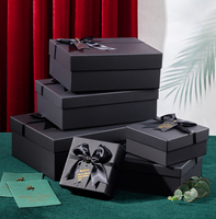 Vendita calda scatola di imballaggio regalo di carta di cartone nero con nastro di prua carta di lusso imballaggio sacchetti di carta scatole di carta per regali