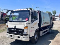Camion à ordures compacteur HOWO 8m³ d'occasion |   Liste de prix des camions à ordures Sinotruk d'occasion |   Fabricant de camions à ordures multifonctionnels