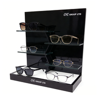 Présentoir à lunettes OEM en acrylique noir pour magasins de lunettes et vitrines de vente au détail