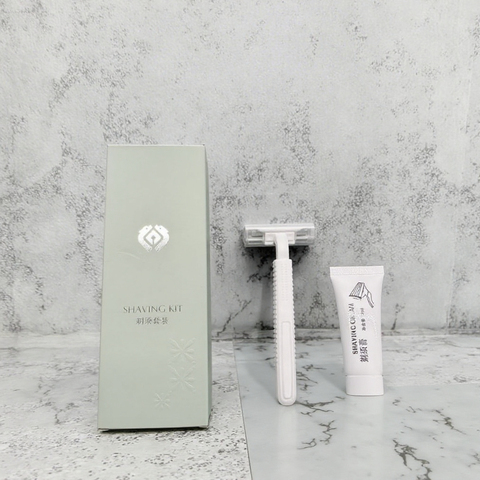White Disposable Razor with Plastic Handle and Stainless Steel Twin Blades for Hotels