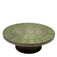 Table basse artisanale ronde en bois minimaliste avec base en métal vert pour meubles de salon et décoration artistique