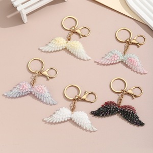 New Luminous Firefly Angel Wing Keychain Resin Glitter Wing Car Bag Pendant Fashion Accessory