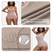 Body modelant le corps à la mode pour les femmes serrant le body amincissant à haute élasticité.