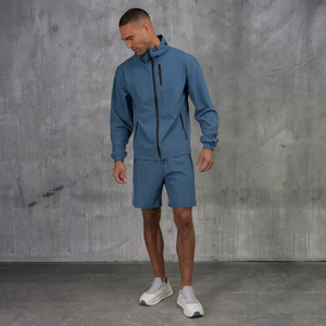 Chaqueta cortavientos con capucha y pantalones cortos para hombre, ligera, con cremallera completa, para deportes al aire libre, informal, con bolsillos con cremallera y puños elásticos - Product Image 1