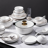 Service de vaisselle en céramique en forme de lune à bord noir pour la maison, l'hôtel, le restaurant, assiettes et bols