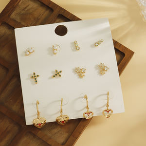 Pendientes <span class=keywords><strong>de</strong></span> aro delicados <span class=keywords><strong>de</strong></span> aleación <span class=keywords><strong>de</strong></span> metal <span class=keywords><strong>con</strong></span> <span class=keywords><strong>perla</strong></span> circón diseños mixtos minimalistas pendientes casuales diarios para mujeres jóvenes - Product Image 1