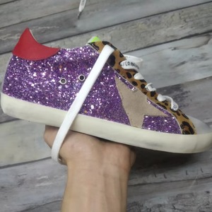 Zapatos casuales de lujo con forma de estrella, estilo retro, para hombre y mujer, unisex, de cuero, de caña baja, ideales para parejas. - Product Image 1