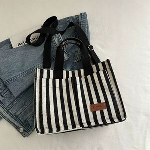 Striped Canvas Tote Stylish Thick Tote Bag with Sturdy Handles and Bottom Cruelty Free Black Blue Food Safe Usage - Product Image 1