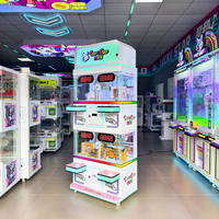 Machine à griffes commerciale 4 joueurs avec accepteur de pièces, jeu de défi de 10 secondes, jeu de tapotement à temps limité, verre trempé, prise en charge de l'anglais, OEM ODM