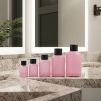 Fuyun Bouteille en verre pour soins de la peau en petite quantité 15ml/30ml/60ml/125ml/200ml Bouchon à vis noir en forme de cylindre rose mat pour l'utilisation de tampons