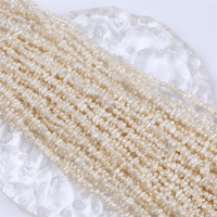 Grossiste - Brins de perles d'eau douce Keshi naturelles blanches de petite taille (2-3 mm)