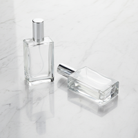 Flacons de parfum de luxe personnalisables en verre carré, capacité de 50 ml, design rechargeable avec bouchon compte-gouttes et givrage sérigraphié
