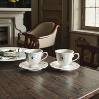 Service de table en céramique peint à la main, motif hirondelle en relief sous glaçure, design moderne et simple, comprenant bol, assiette, bouilloire, tasse à café haut de gamme