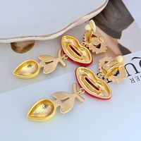 Boucles d'oreilles longues à clip en émail peint, motif citron, yeux et bouche larges, style mode européenne et américaine