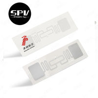 Étiquettes adhésives en papier intelligent d'autocollant de puce RFID UHF imprimables de code à barres de prix bas pour la gestion d'entrepôt de logistique de livre de bibliothèque
