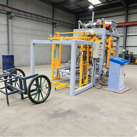 Machine à fabriquer des blocs creux en béton à bas prix en Chine, machine à fabriquer des pavés emboîtables QT4-25, machine hydraulique à fabriquer des blocs de ciment et des briques